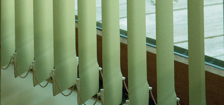 Green Vertical Blind with stabilising chain